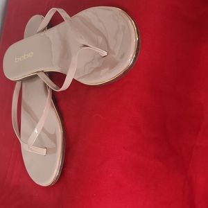 PINK with Gold trim bebe patent leather flip flops